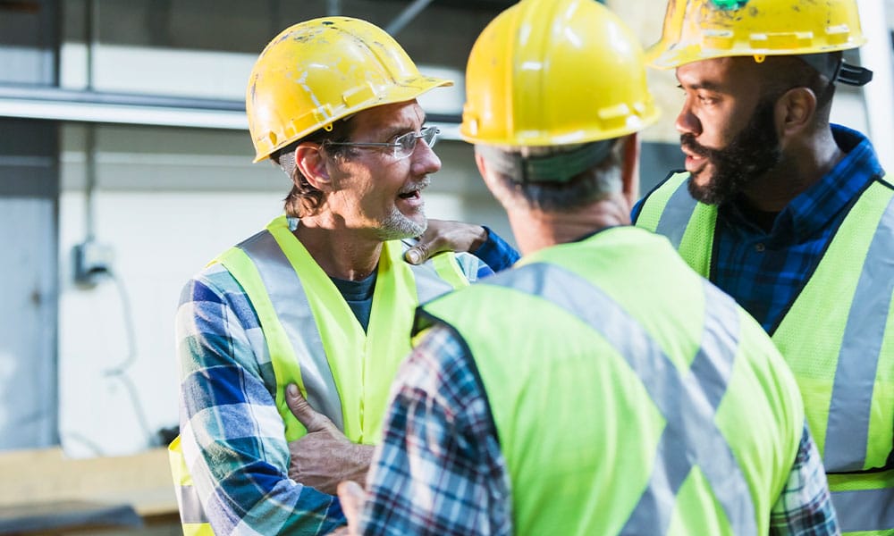 construction workers discussing a construction dispute in Los Angeles