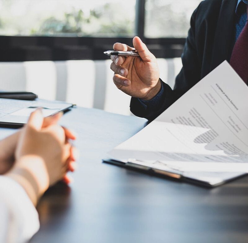 lawyer and their client discussing environmental real estate laws in Los Angeles