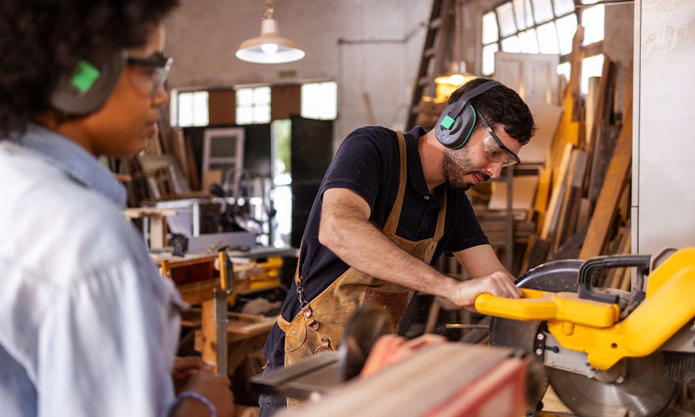 construction workers in San Diego training how to use equipment