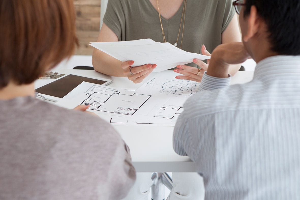 workers discussing a construction defect in san diego