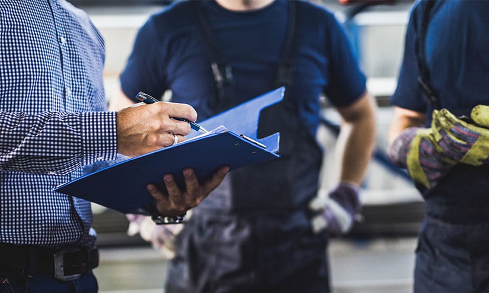 workers meeting with a lawyer after being injured on a construction site in Los Angeles, CA