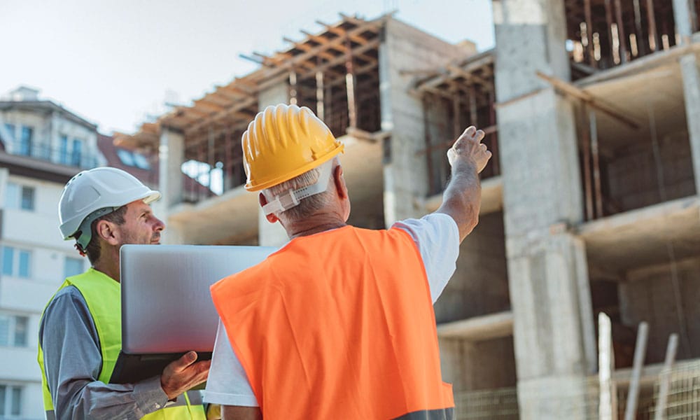 workers resolving a delay on a construction site in Los Angeles, CA