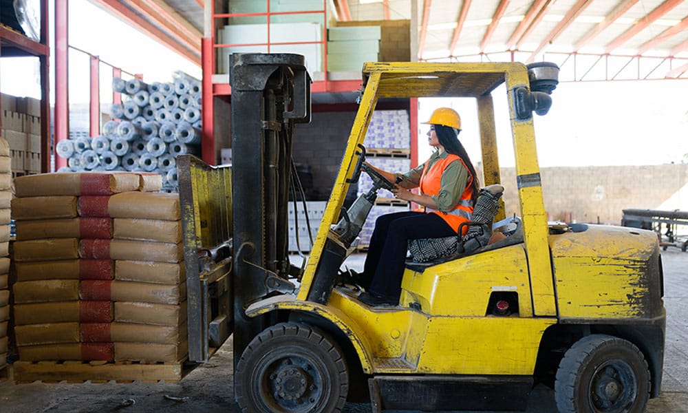 worker operating a forklift on a construction site in San Diego, CA