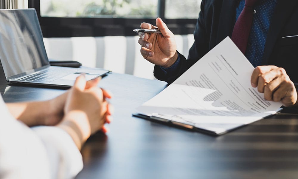 client and lawyer reviewing a commercial lease agreement in Los Angeles, CA