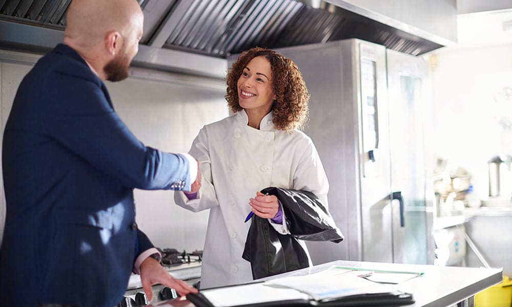tenant and landlord agreeing on a commercial lease in San Diego, CA