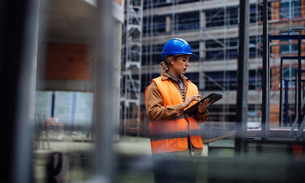 worker documenting OSHA violations on a San Diego construction site