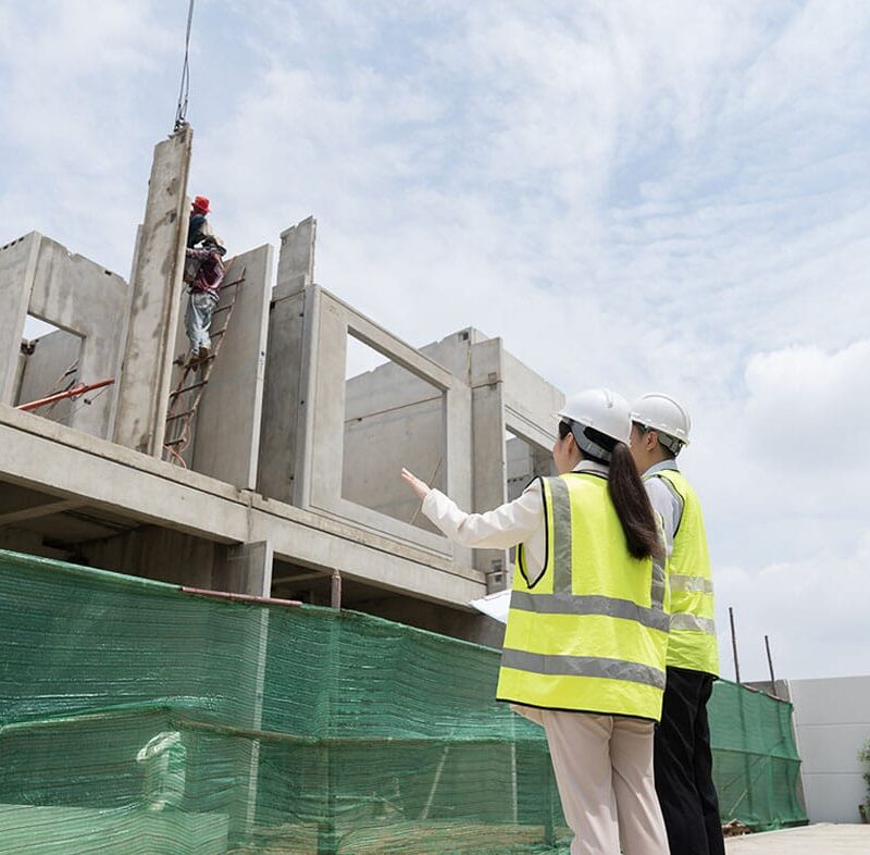 workers reviewing a construction defect in Los Angeles, CA