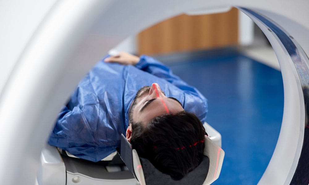 man getting a scan for a traumatic brain injury from a construction site in Los Angeles, CA